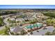 Aerial view of community pool and surrounding homes at 5564 Coachwood Cv, Bradenton, FL 34211