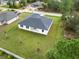 Aerial view of the house and backyard at 5595 Delight Ave, North Port, FL 34288