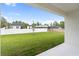 View of backyard from covered patio at 5595 Delight Ave, North Port, FL 34288