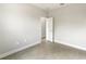 Bedroom with tile floors and a door at 5595 Delight Ave, North Port, FL 34288