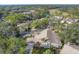 Community overview with golf course and lush landscaping at 5625 Pipers Waite # 9, Sarasota, FL 34235