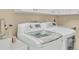 Laundry room with LG washer and dryer, offering convenience at 5625 Pipers Waite # 9, Sarasota, FL 34235