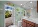 Bathroom with access to the backyard at 5826 Driftwood Pl # 34, Sarasota, FL 34231