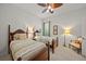 Guest bedroom with two twin beds and a sitting chair at 5826 Driftwood Pl # 34, Sarasota, FL 34231