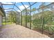 Large screened patio perfect for outdoor relaxation at 5826 Driftwood Pl # 34, Sarasota, FL 34231