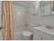 Clean bathroom with a tub, sink, and medicine cabinet at 5928 Welcome Rd # H4, Bradenton, FL 34207