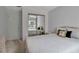 Spacious bedroom with mirrored closet doors and a queen bed at 5928 Welcome Rd # H4, Bradenton, FL 34207