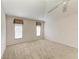 Spacious bedroom featuring a ceiling fan and neutral carpeting at 601 Lakescene Dr, Venice, FL 34293