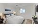 Main bedroom with large bed and stylish decor at 601 Lakescene Dr, Venice, FL 34293