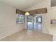 Breakfast nook with sliding doors leading to pool at 601 Lakescene Dr, Venice, FL 34293