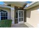 Front entrance with a decorative screen door at 601 Lakescene Dr, Venice, FL 34293