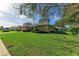 Single story house with lush green lawn at 601 Lakescene Dr, Venice, FL 34293