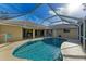 Enjoy this refreshing pool with screened enclosure at 601 Lakescene Dr, Venice, FL 34293