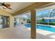 Inviting pool area with screened enclosure and patio at 601 Lakescene Dr, Venice, FL 34293