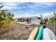 Kayaks in the backyard with patio and shed at 6045 Slade Rd, North Port, FL 34287