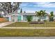 Charming ranch home with landscaped yard and attached garage at 6045 Slade Rd, North Port, FL 34287