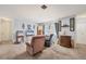 Living room with hardwood floors and large windows at 6045 Slade Rd, North Port, FL 34287