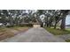 Ranch style home with a two-car garage and driveway at 616 Pawn Way, Seffner, FL 33584