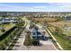 Aerial view of Talon Preserve, showcasing homes and landscaping at 6299 Crested Eagle Ln, Nokomis, FL 34275