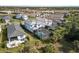 Aerial view of homes with pools and lush landscaping at 6299 Crested Eagle Ln, Nokomis, FL 34275