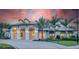 Stunning clubhouse with covered entry and landscaping at 6299 Crested Eagle Ln, Nokomis, FL 34275