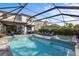 Large pool and spa with plenty of lounge chairs at 6299 Crested Eagle Ln, Nokomis, FL 34275