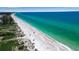 Wide aerial view of a beautiful beach at 630 Companion Way, Longboat Key, FL 34228