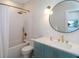 Modern bathroom with a large mirror, and a tub shower combo at 630 Companion Way, Longboat Key, FL 34228