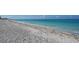 Scenic view of a tranquil beach with clear water at 630 Companion Way, Longboat Key, FL 34228