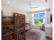 ' bedroom with a bunk bed, and plenty of natural light at 630 Companion Way, Longboat Key, FL 34228