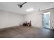 Spacious garage with high ceilings and concrete floor at 630 Companion Way, Longboat Key, FL 34228