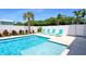 Enjoy this refreshing pool and spa with lounge chairs at 630 Companion Way, Longboat Key, FL 34228