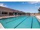 Inviting swimming pool with swim lanes at 630 Companion Way, Longboat Key, FL 34228