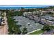 Aerial view of community tennis courts near the beach at 630 Companion Way, Longboat Key, FL 34228