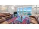 Living room with ocean view and leather sofas at 6300 Midnight Pass Rd # 810, Sarasota, FL 34242