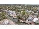 Aerial showing home on canal with boats and other houses at 633 Avenida De Mayo, Sarasota, FL 34242