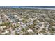 Aerial view of canal-side homes and landscape at 633 Avenida De Mayo, Sarasota, FL 34242