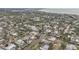 Aerial view of canal-front homes and neighborhood at 633 Avenida De Mayo, Sarasota, FL 34242