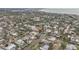 Aerial view of home on canal with surrounding houses at 633 Avenida De Mayo, Sarasota, FL 34242