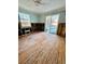 Under renovation bedroom with hardwood floors and sliding glass doors at 633 Avenida De Mayo, Sarasota, FL 34242