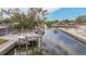 Private boat lift on a peaceful canal at 633 Avenida De Mayo, Sarasota, FL 34242