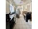 Kitchen with stainless steel appliances and tiled floors at 633 Avenida De Mayo, Sarasota, FL 34242