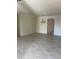 Open dining room with tile floors and a modern chandelier at 6442 Willowshire Way, Bradenton, FL 34212