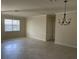 Bright dining room featuring tile floors and a chandelier at 6442 Willowshire Way, Bradenton, FL 34212