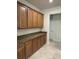 Well-equipped kitchen featuring wood cabinets and granite countertops at 6442 Willowshire Way, Bradenton, FL 34212