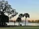 Serene lake view with fountain and residential backdrop at 6442 Willowshire Way, Bradenton, FL 34212