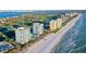 Aerial view of building and surrounding beach area at 655 Longboat Club Rd # 14A, Longboat Key, FL 34228