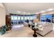 Elegant living room boasting ocean views and ample natural light at 655 Longboat Club Rd # 14A, Longboat Key, FL 34228