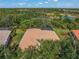 Aerial view of house and surrounding landscape at 790 Shadow Bay Way, Osprey, FL 34229