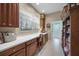 Bright study with built-in cabinetry and workspace at 790 Shadow Bay Way, Osprey, FL 34229